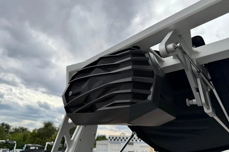 Slide: The Image of 2025 Nautique Super Air Nautique GS24 boat speaker under cloudy sky. - 39
