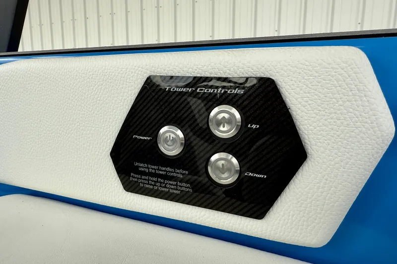 Slide: The Image of 2025 Nautique Super Air Nautique GS24 tower controls with power, up, and down buttons. - 41