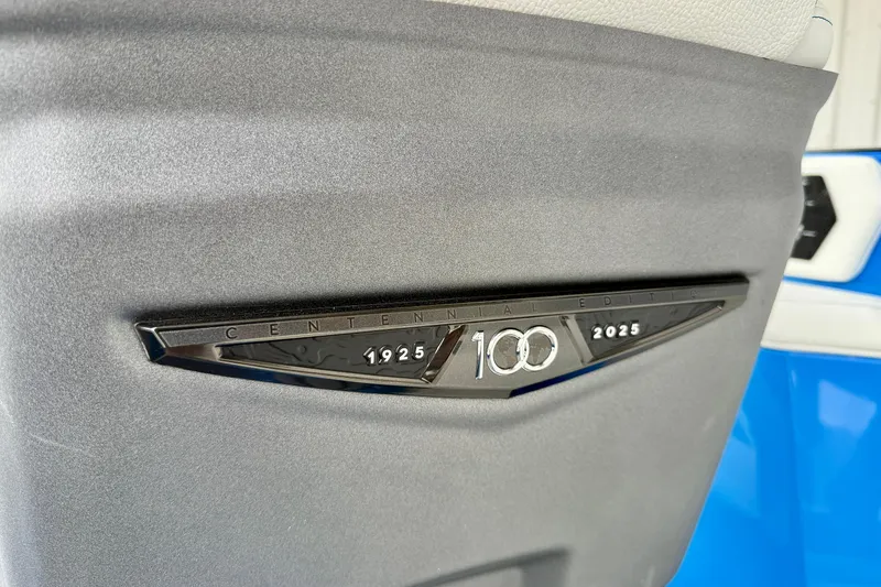 Slide: The Image of Centennial edition badge on 2025 Nautique Super Air Nautique GS24 boat. - 42