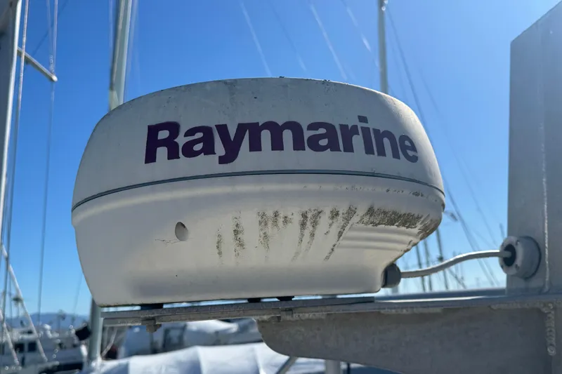 Slide: The Image of Raymarine radar on 2005 Ocean Sport Roamer 30 boat under clear blue sky. - 10