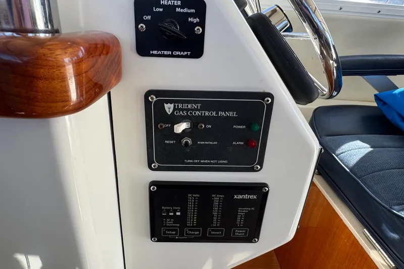 Slide: The Image of Control panel on 2005 Ocean Sport Roamer 30 boat with gas and heater settings. - 29