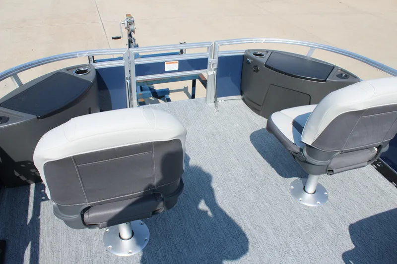Slide: The Image of 2026 Sun Tracker Bass Buggy 18 DLX boat interior with two swivel seats. - 19