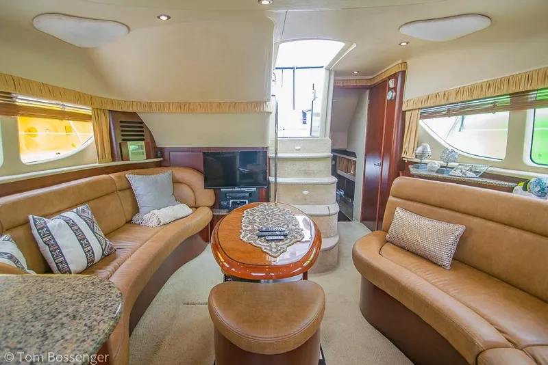 Slide: The Image of Luxurious interior of a 2005 Sea Ray 390 Motor Yacht with plush seating and elegant decor. - 11