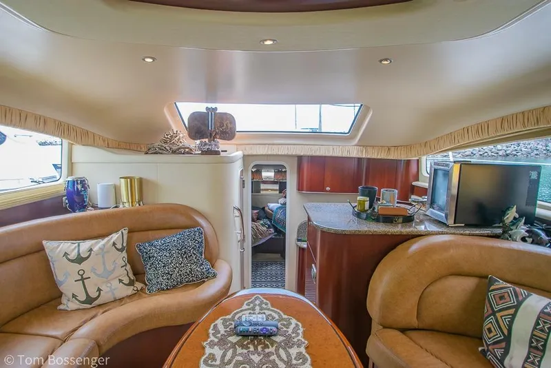 Slide: The Image of Luxurious interior of a 2005 Sea Ray 390 Motor Yacht with elegant seating and decor. - 15