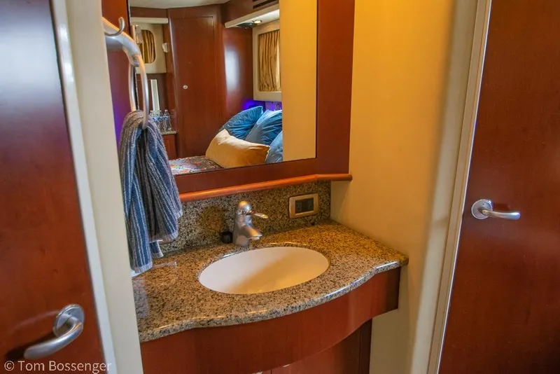 Slide: The Image of Luxurious bathroom interior of 2005 Sea Ray 390 Motor Yacht with granite countertop. - 28