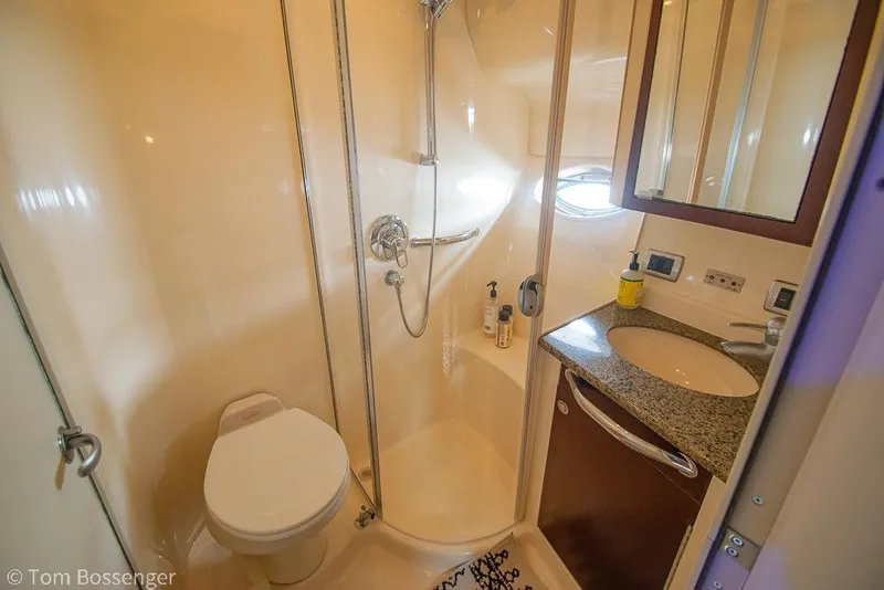 Slide: The Image of Luxurious bathroom in 2005 Sea Ray 390 Motor Yacht with shower and vanity. - 38