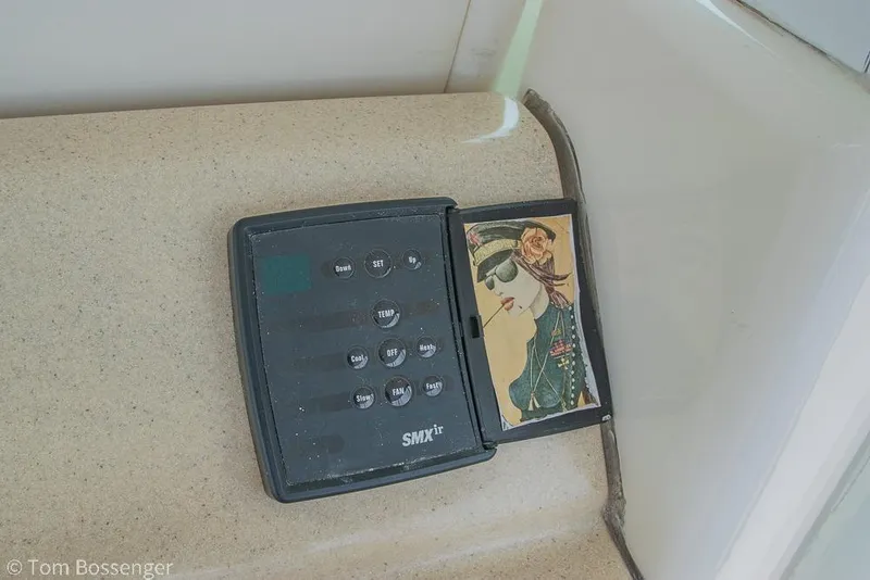 Slide: The Image of Control panel on 2005 Sea Ray 390 Motor Yacht with decorative image. - 47