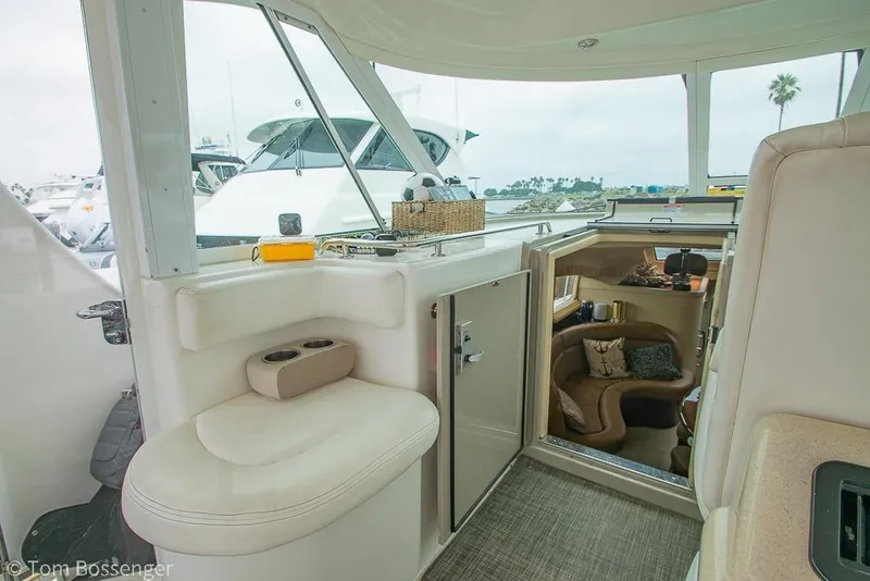 Slide: The Image of 2005 Sea Ray 390 Motor Yacht interior with seating and cabin view. - 49