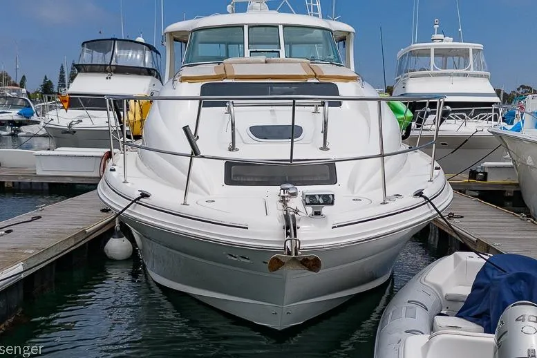Slide: The Image of 2005 Sea Ray 390 Motor Yacht docked at marina, front view. - 62