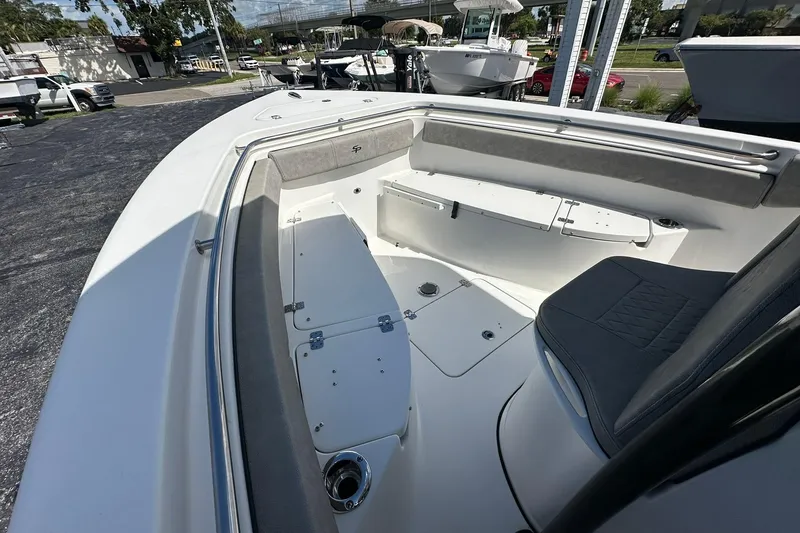 Slide: The Image of 2023 Sea Pro 219 Deep V CC boat interior with seating and storage compartments. - 37