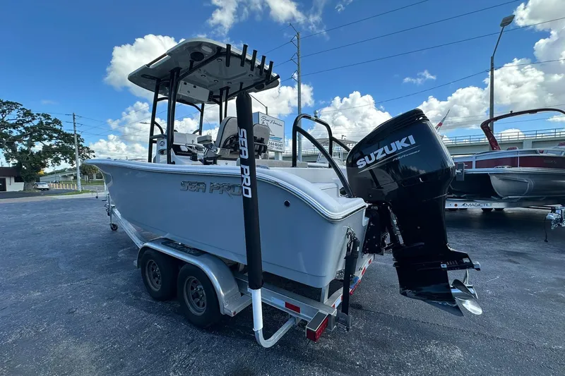 Slide: The Image of 2023 Sea Pro 219 Deep V CC boat with Suzuki outboard motor on trailer. - 9