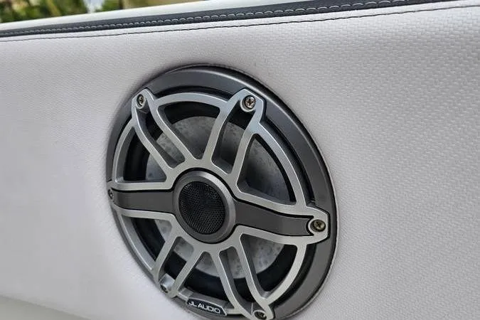 Slide: The Image of Speaker on 1997 Fountain Sportfish 27 boat, featuring JL Audio design. - 12