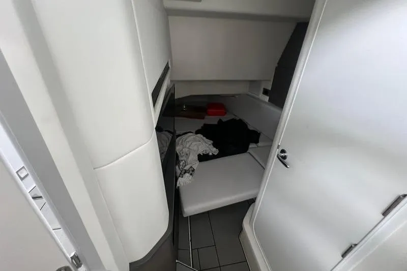 Slide: The Image of 2023 Aviara 36 cabin interior with modern design and seating area. - 7