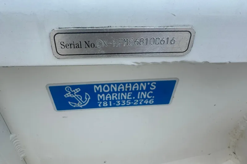 Slide: The Image of 2016 Highfield RS-460 boat serial number plate and Monahan's Marine sticker. - 6