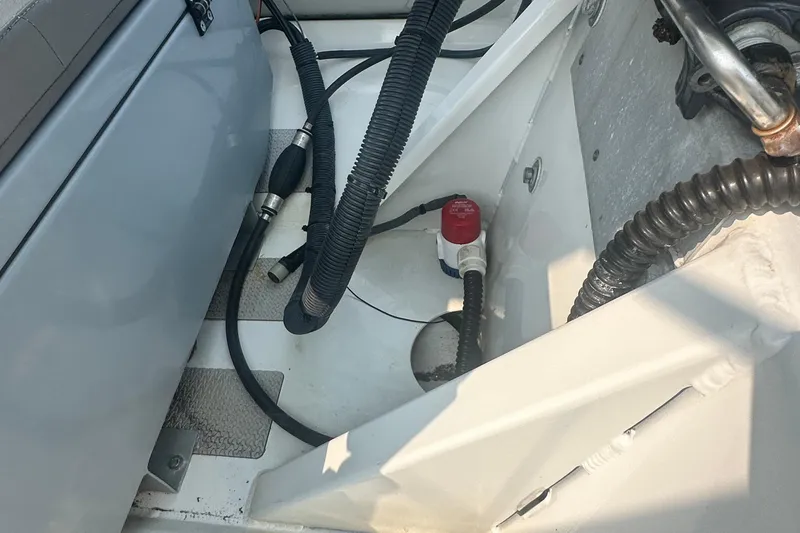 Slide: The Image of Interior view of a 2016 Highfield RS-460 boat showing cables and equipment. - 8