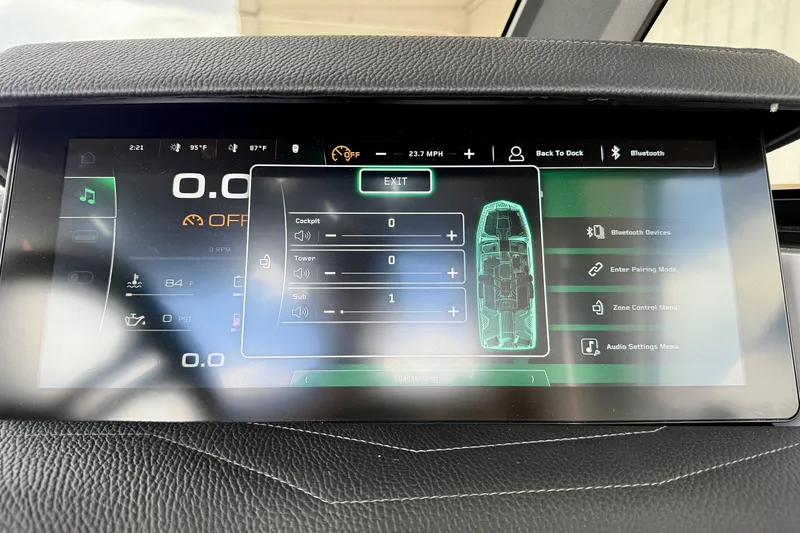 Slide: The Image of 2026 Nautique Super Air Nautique G23 touchscreen display showing audio and control settings. - 33