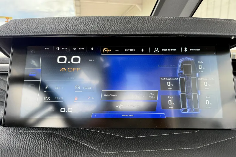 Slide: The Image of 2026 Nautique Super Air Nautique G23 dashboard display with speed, ballast, and system controls. - 34