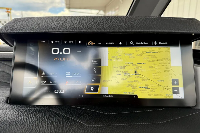 Slide: The Image of Dashboard display of 2026 Nautique Super Air Nautique G23 with navigation and controls. - 36