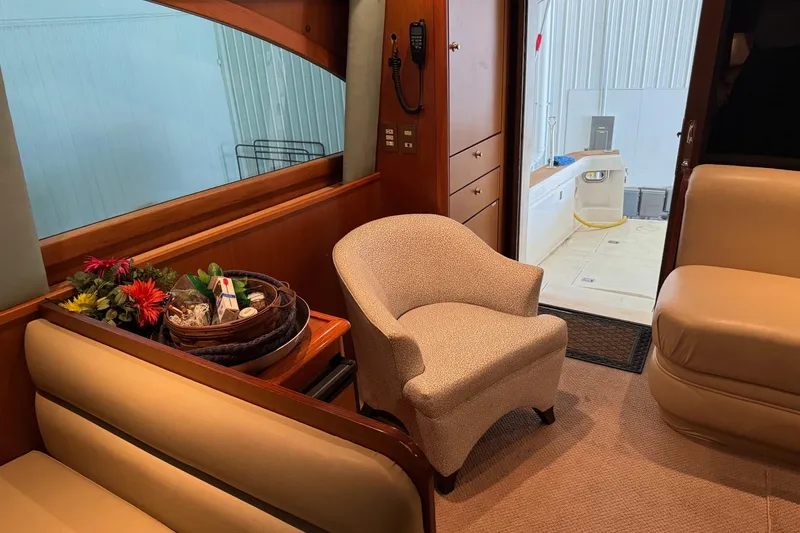 Slide: The Image of Luxurious interior of 2005 Fifth Ocean Yachts 46 SS with elegant seating and decor. - 6