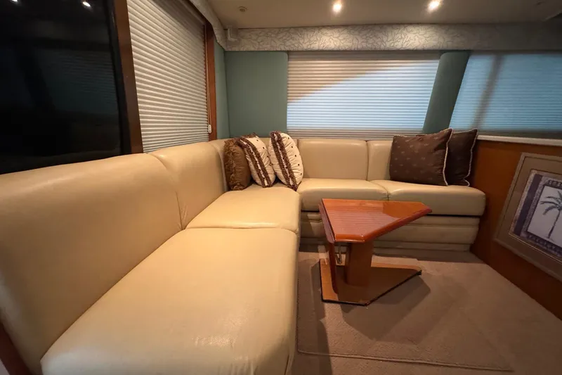 Slide: The Image of Luxurious interior of 2005 Fifth Ocean Yachts 46 SS with beige leather seating. - 9