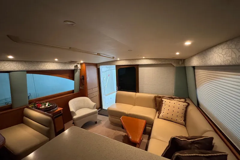 Slide: The Image of Luxurious interior of 2005 Fifth Ocean Yachts 46 SS with elegant seating and modern decor. - 11