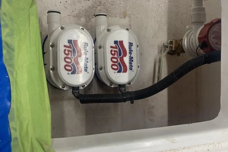 Slide: The Image of Bilge pumps in a 2022 Paramount 21 boat, featuring Rule-Mate 1500 models. - 9