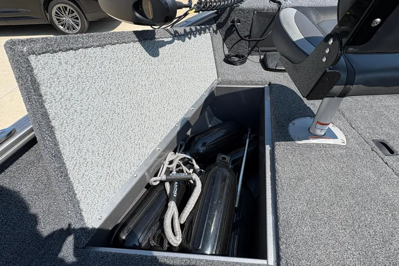 Slide: The Image of 2020 Lund 1775 Adventure SS boat storage compartment with ropes and equipment. - 11