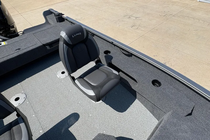 Slide: The Image of 2020 Lund 1775 Adventure SS boat interior with seating and carpeted flooring. - 16