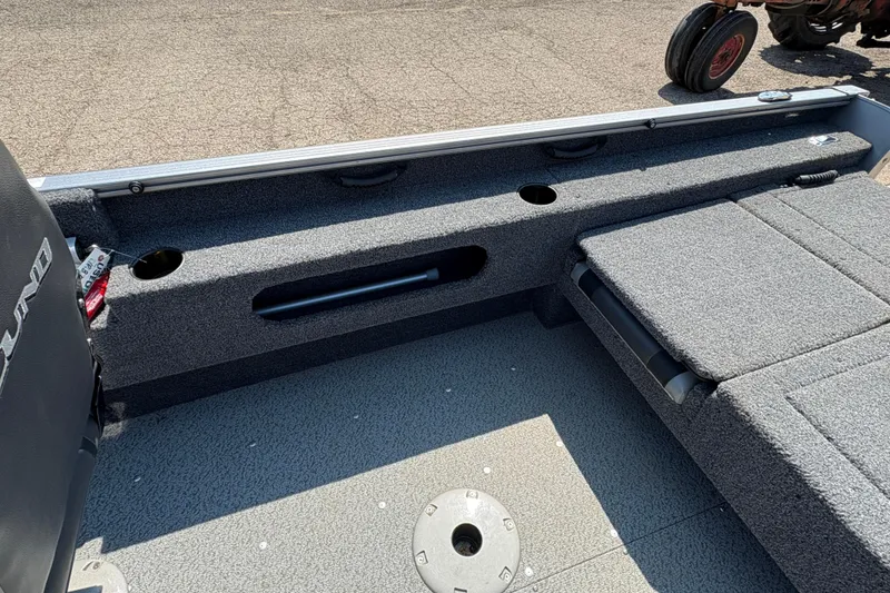 Slide: The Image of 2020 Lund 1775 Adventure SS boat interior with seating and storage compartments. - 17