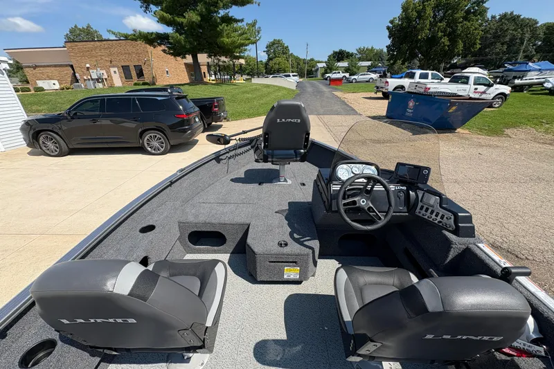Slide: The Image of 2020 Lund 1775 Adventure SS boat interior with steering console and seating. - 18