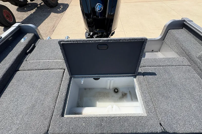 Slide: The Image of 2020 Lund 1775 Adventure SS boat with open storage compartment, showcasing interior design. - 21