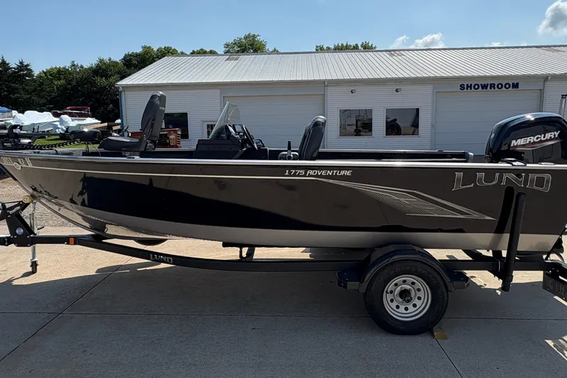 Slide: The Image of 2020 Lund 1775 Adventure SS boat on trailer outside showroom. - 4