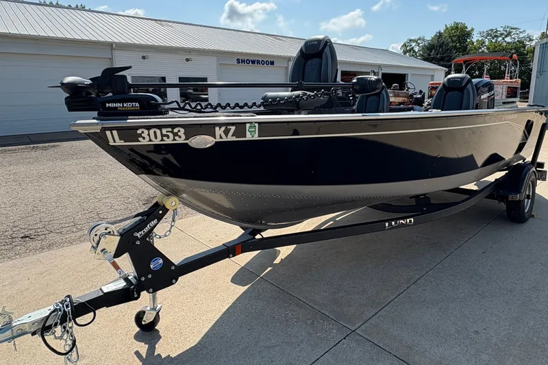 Slide: The Image of 2020 Lund 1775 Adventure SS boat on trailer outside showroom. - 5