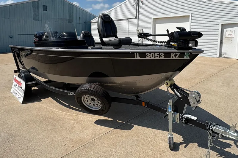 Slide: The Image of 2020 Lund 1775 Adventure SS boat on trailer, parked outdoors. - 7