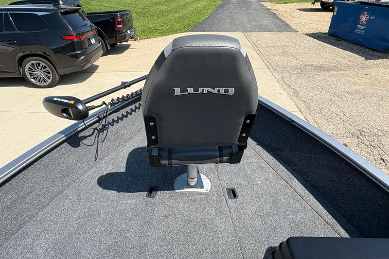 Slide: The Image of 2020 Lund 1775 Adventure SS boat with a gray seat and trolling motor. - 9