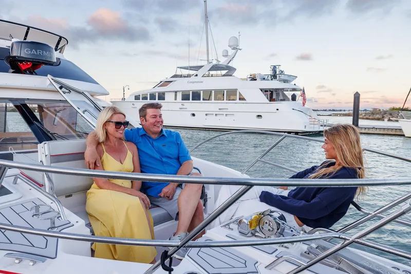 Slide: The Image of Couple enjoying a sunset cruise on a 2026 Solara S-310 SB yacht. - 11