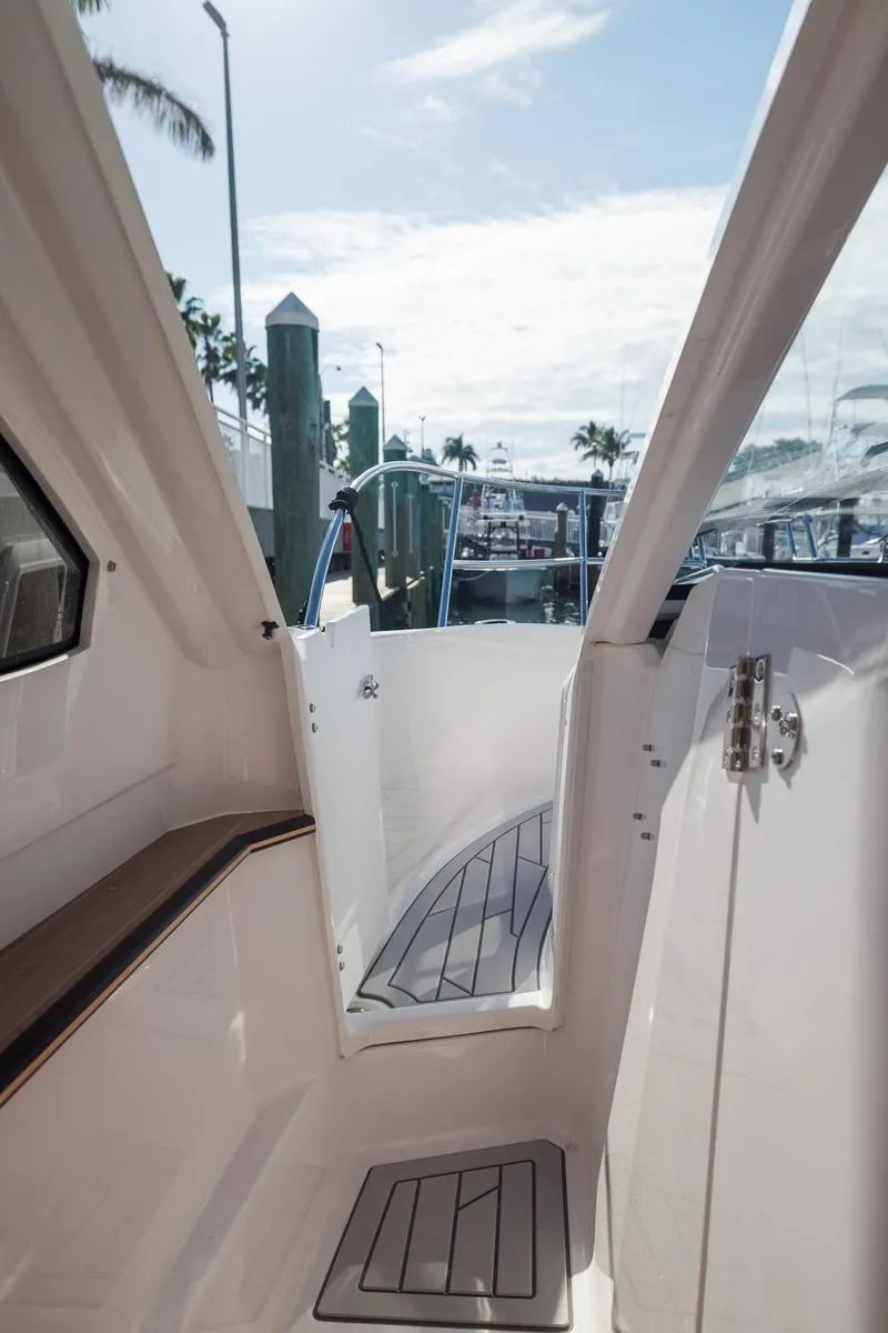 Slide: The Image of Interior view of 2026 Solara S-310 SB boat, featuring sleek design and modern finishes. - 16