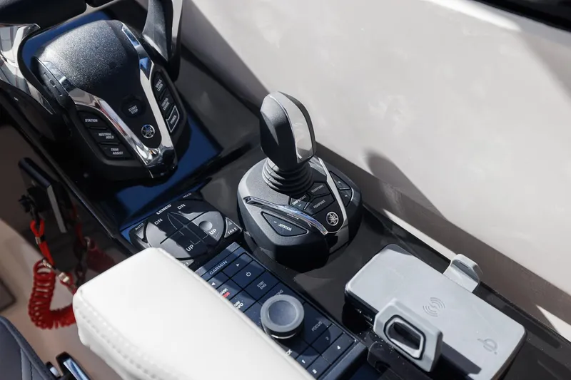 Slide: The Image of Control panel of 2026 Solara S-310 SB boat with joystick and throttle. - 25