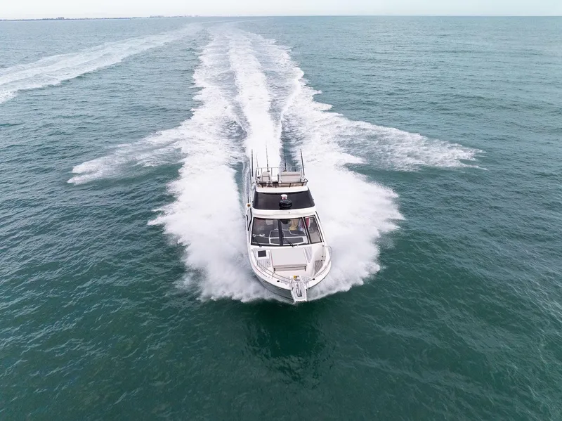 Slide: The Image of 2026 Solara S-310 SB speedboat cruising swiftly on open water. - 7