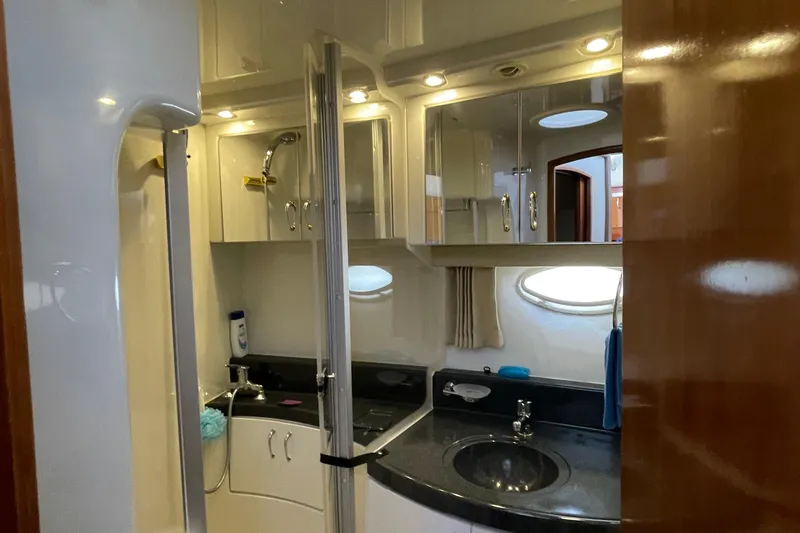 Slide: The Image of 2003 Carver 36 Sport Sedan bathroom with modern fixtures and sleek design. - 17