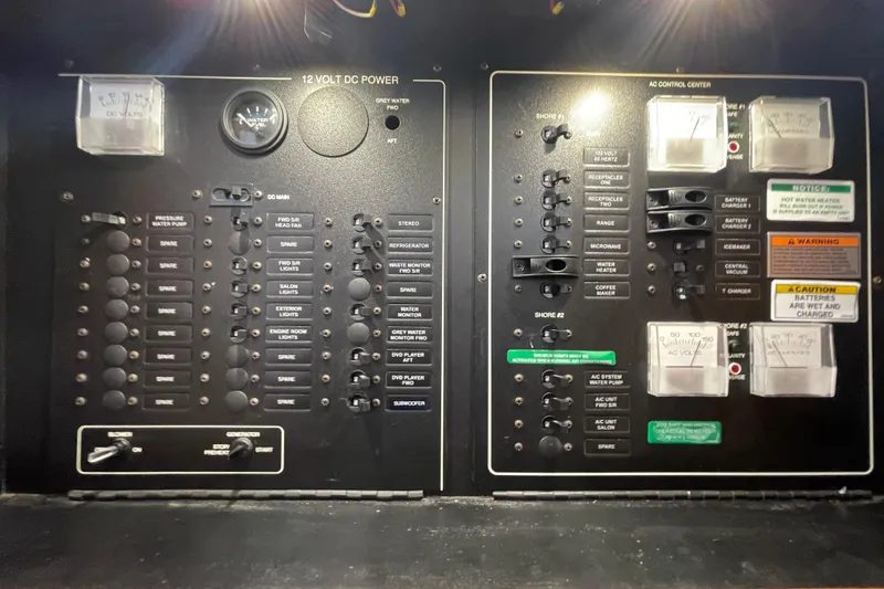 Slide: The Image of Electrical control panel of a 2003 Carver 36 Sport Sedan boat. - 26