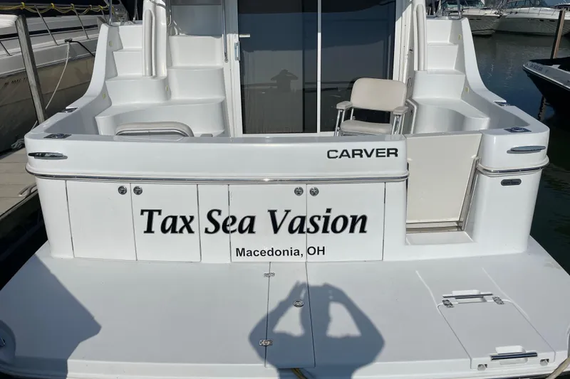 Slide: The Image of 2003 Carver 36 Sport Sedan boat named "Tax Sea Vasion" docked in Macedonia, OH. - 4