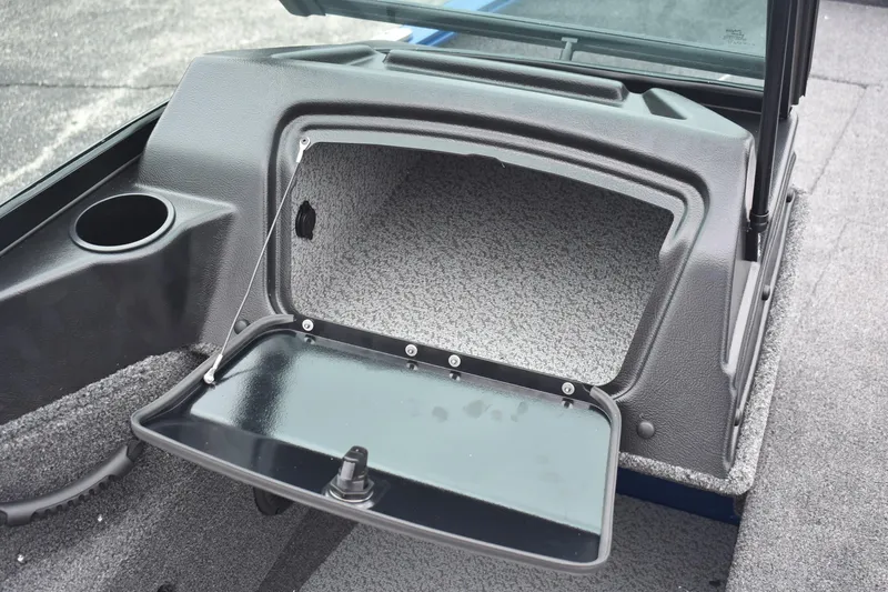 Slide: The Image of 2026 Lund 1775 Adventure Sport boat storage compartment with open lid, showcasing interior space. - 12