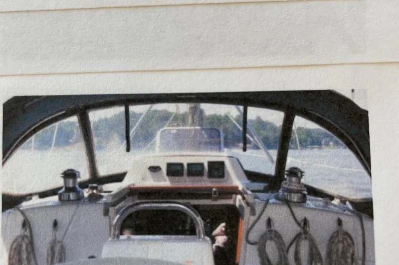 Slide: The Image of Cockpit view of a 1998 Hunter 340 sailboat with ropes and winches. - 2