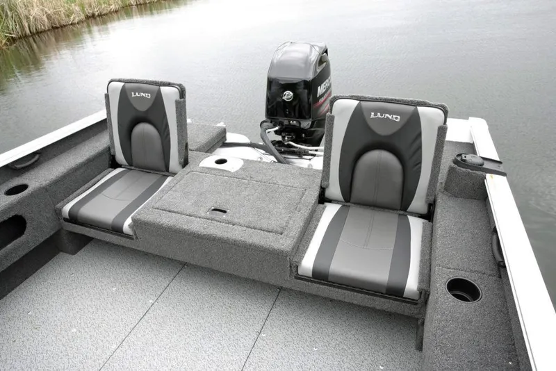 Slide: The Image of Manufacturer Provided Image: 2022 Lund 1675 Adventure Sport boat interior with dual seats and Mercury outboard motor. - 24