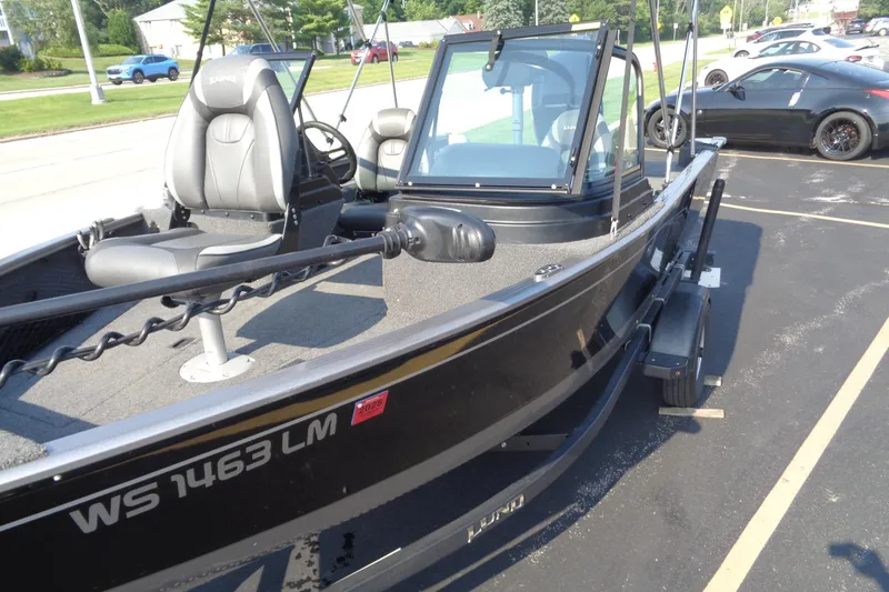 Slide: The Image of 2022 Lund 1675 Adventure Sport boat on trailer in parking lot. - 4