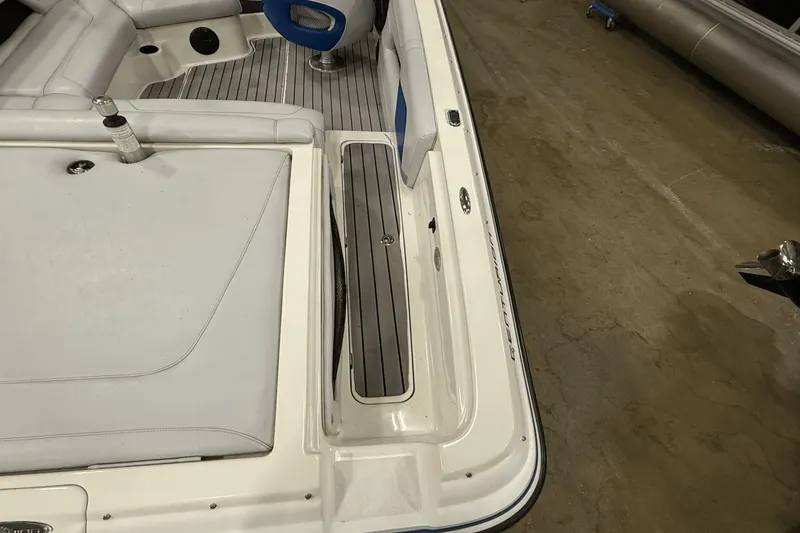 Slide: The Image of 2004 Centurion Avalanche C4 boat interior with gray seating and blue accents. - 7