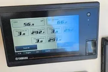 Slide: The Image of Yamaha display showing engine hours and fuel usage on a 2022 Grady-White Canyon 336. - 11
