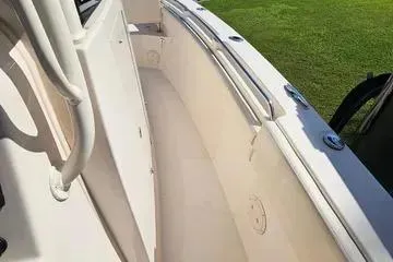 Slide: The Image of 2022 Grady-White Canyon 336 boat interior with sleek design and stainless steel railings. - 18