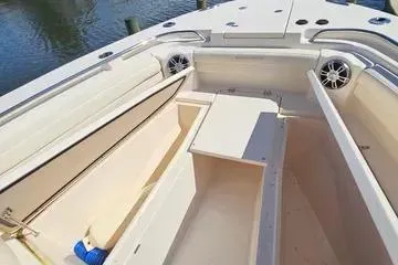 Slide: The Image of 2022 Grady-White Canyon 336 boat interior with spacious storage compartments. - 23